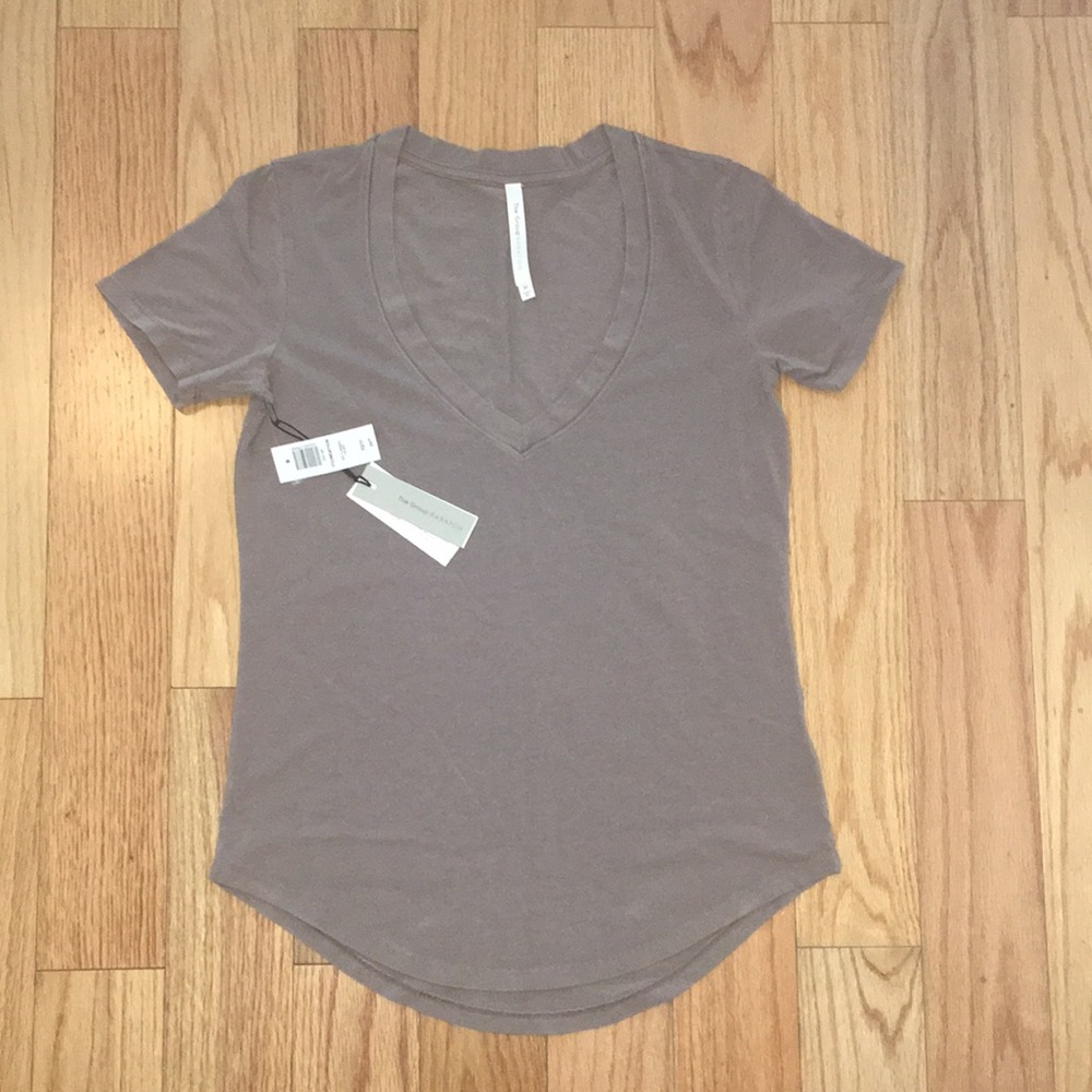 The Group by Babaton Foundation T-shirt NWT